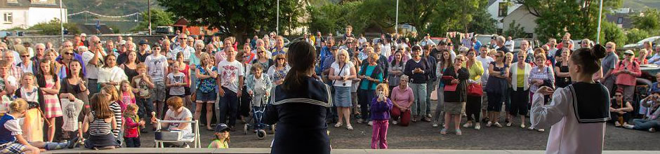 Dancers at the ferry car park band stand